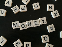 scrabble pieces that spell money