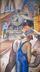 men working and train engine